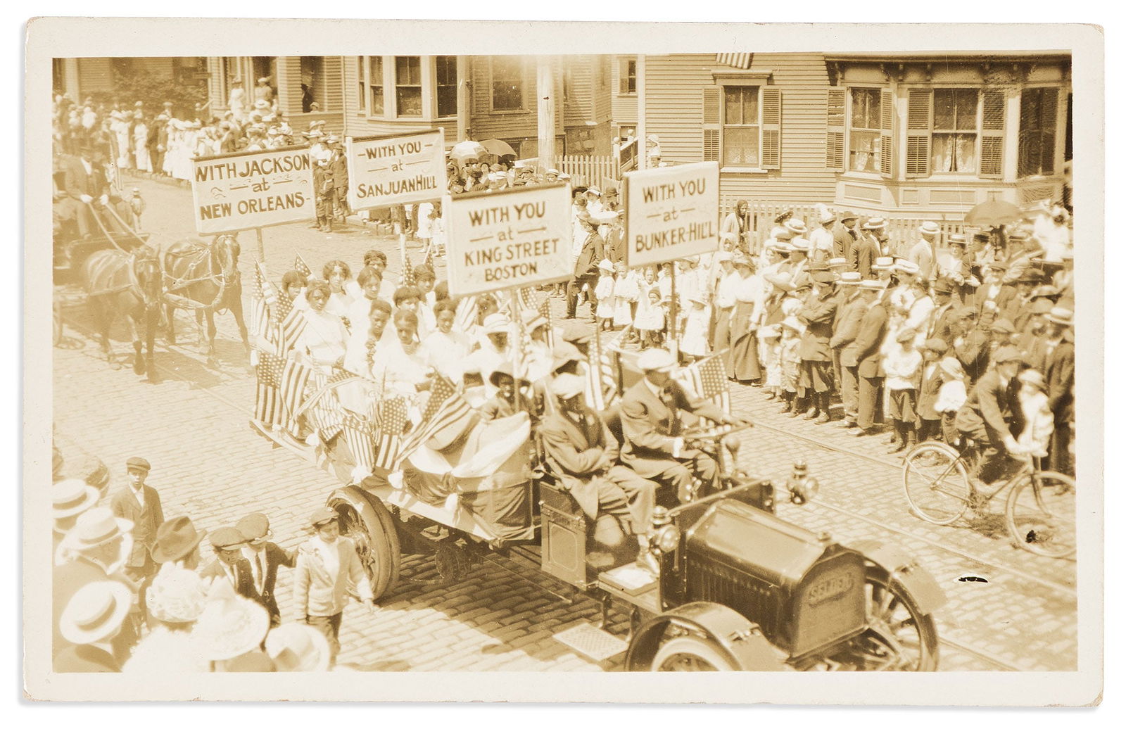 (HISTORY.) Postcard of an Independence Day parade in Massachusetts. [Fall River, 1914]: (HISTORY.)Postcard of an Independence Day parade in Massachusetts.[Fall River, MA, 4 July 1914]Real Photo post card, 3¼ x 5¼ inches; unused, faint partial crease.This Independence Day parade