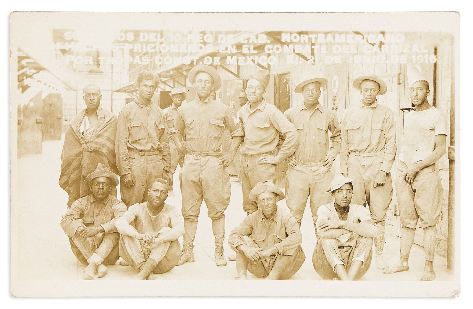 (MILITARY.) Real Photo postcard of Buffalo Soldier prisoners of Mexico upon their release. [El Paso,: (MILITARY.)Real Photo postcard of Buffalo Soldier prisoners of Mexico upon their release.[El Paso, TX?], 21 June 1916Photograph, 3¼ x 5¼ inches, printed for use as a postcard on verso, capti