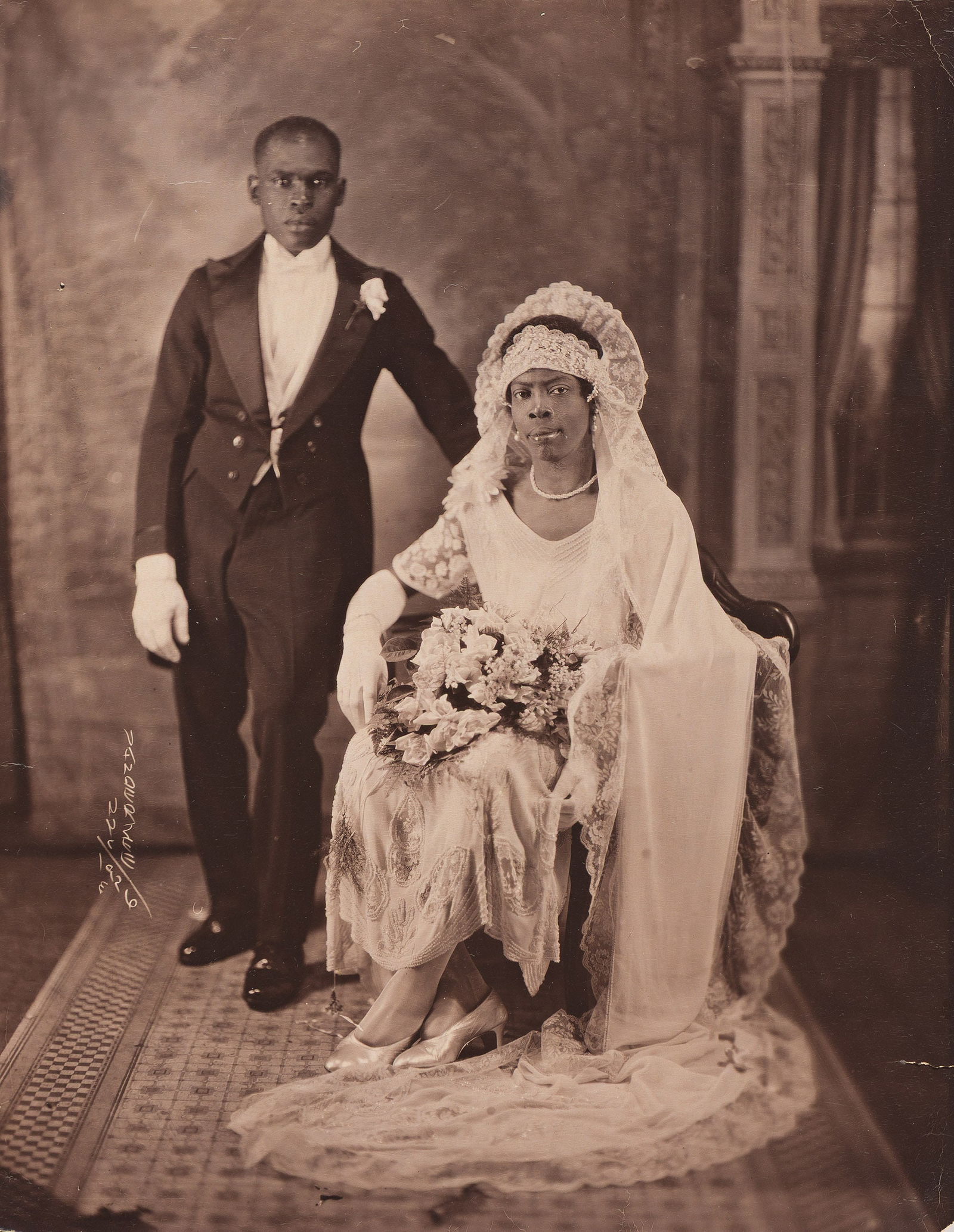 James Vanderzee, Untitled (Bride and Groom), 1926.: James VanDerZee (1886-1986) Untitled (Bride and Groom). Silver print, 1926. With VanDerZee's "G.G.G. Photo Studio, Inc., 109 West 135th St." ink hand stamp on verso. 10 x 8 in. (25.4 x 20.3 cm.), Fram