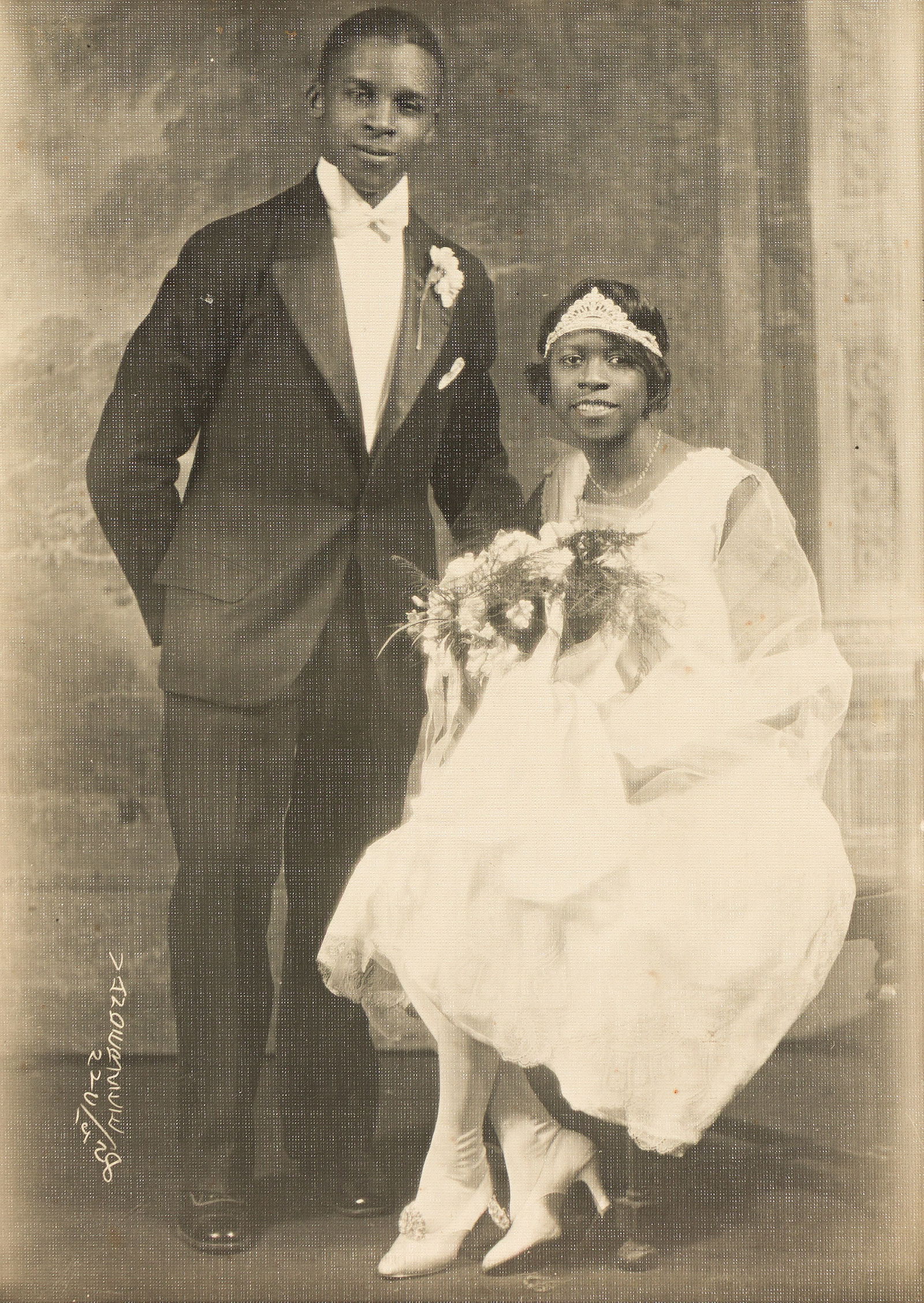 James Vanderzee (1886-1986), Untitled (Wedding Couple), 1928.: James VanDerZee (1886-1986) Untitled (Wedding Couple). Silver print, 1928. 7 x 5 in. (17.8 x 12.7 cm.), Frame: 13 3/4 x 11 3/4 in. (34.9 x 29.8 cm.) Provenance: The collection of Ambassador Shirley E.