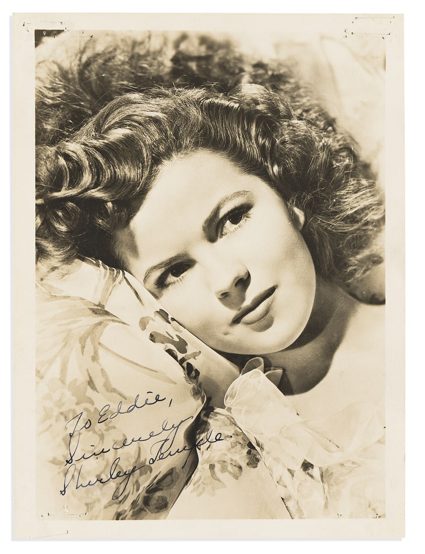 Shirley Temple. Group of 5 Photographs Inscribed and Signed, "Shirley Temple" or "Shirley Temple: Shirley Temple Group of 5 Photographs Inscribed and Signed, "Shirley Temple" or "Shirley Temple Agar," to members of the Fling family, each showing her during the 1940s. Each inscribed in the image at