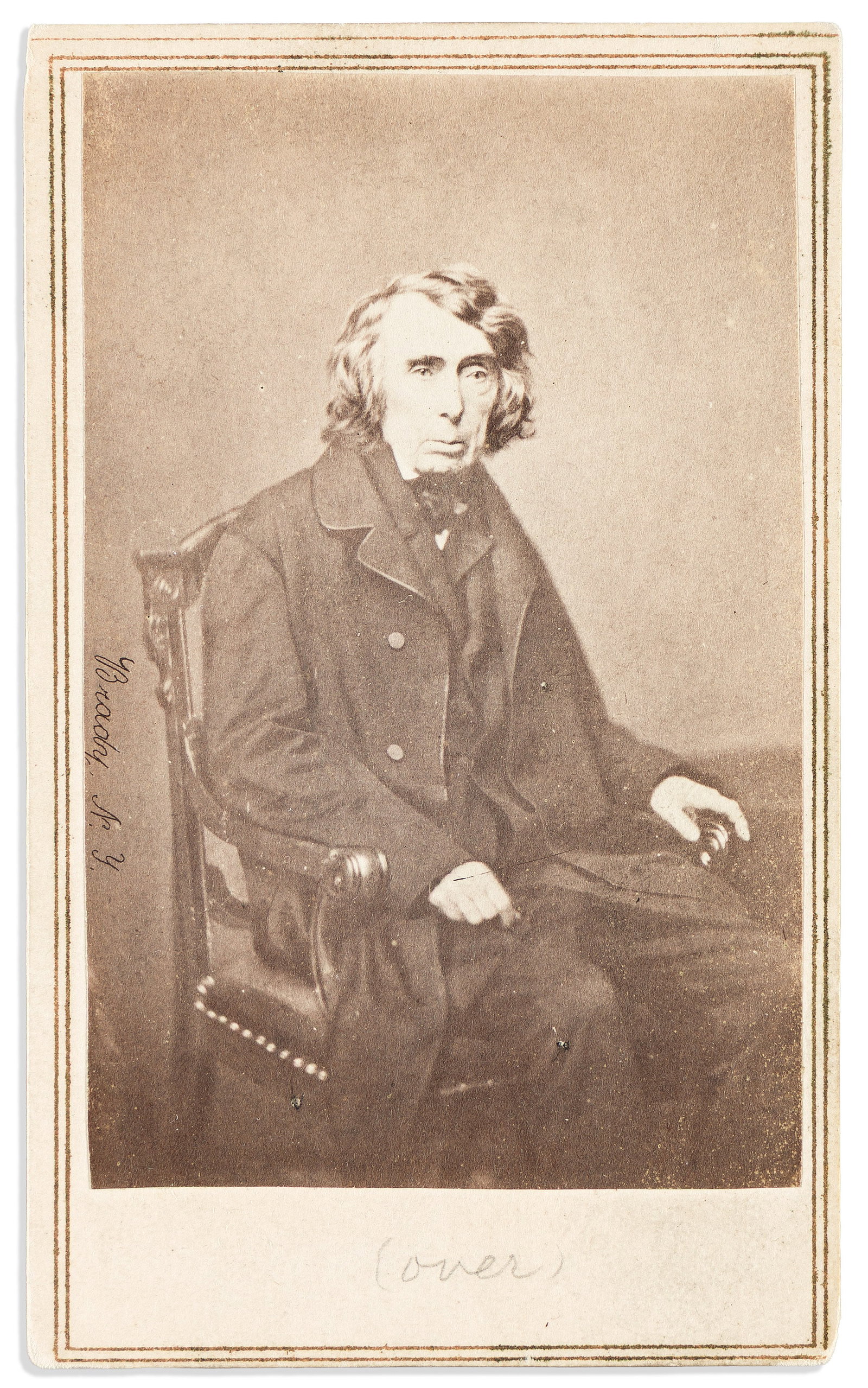 (Supreme Court.) Roger B. Taney. Photograph Signed, "R.B. Taney," on verso: Roger B. Taney Photograph Signed, "R.B. Taney," on verso, half-length portrait by E & H.T. Anthony [from Brady's negative], showing him seated wearing an overcoat while looking to side of camera. 