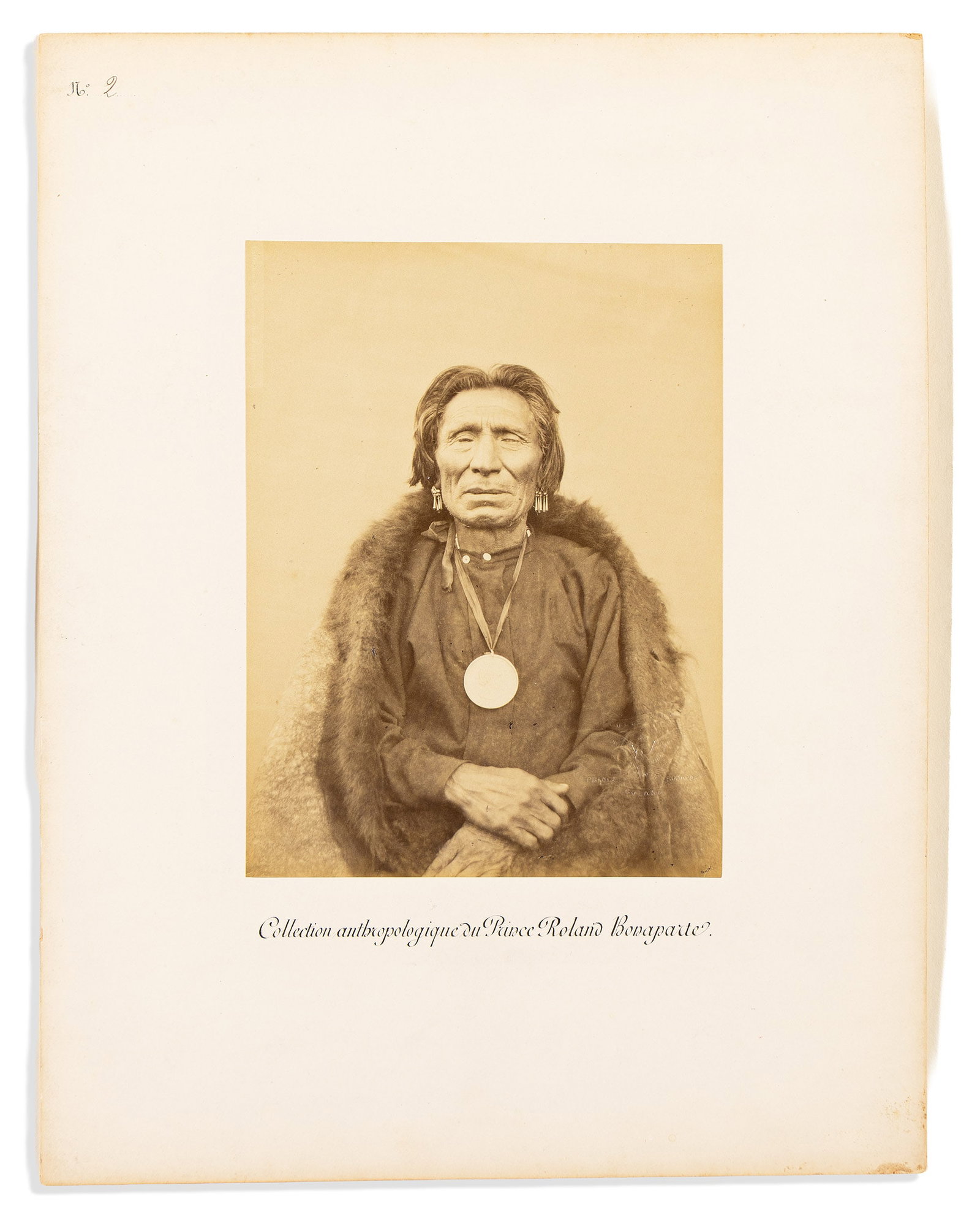 (AMERICAN INDIANS--PHOTOGRAPHS.) 7 portraits commissioned by Prince Roland Bonaparte. [Paris, 1883]: 7 portraits commissioned by Prince Roland Bonaparte. [Paris, circa 1883] 7 albumen photographs, 8¾ x 6½ inches, on 16 x 12¼-inch mounts with printed captions "Collection anthropolo
