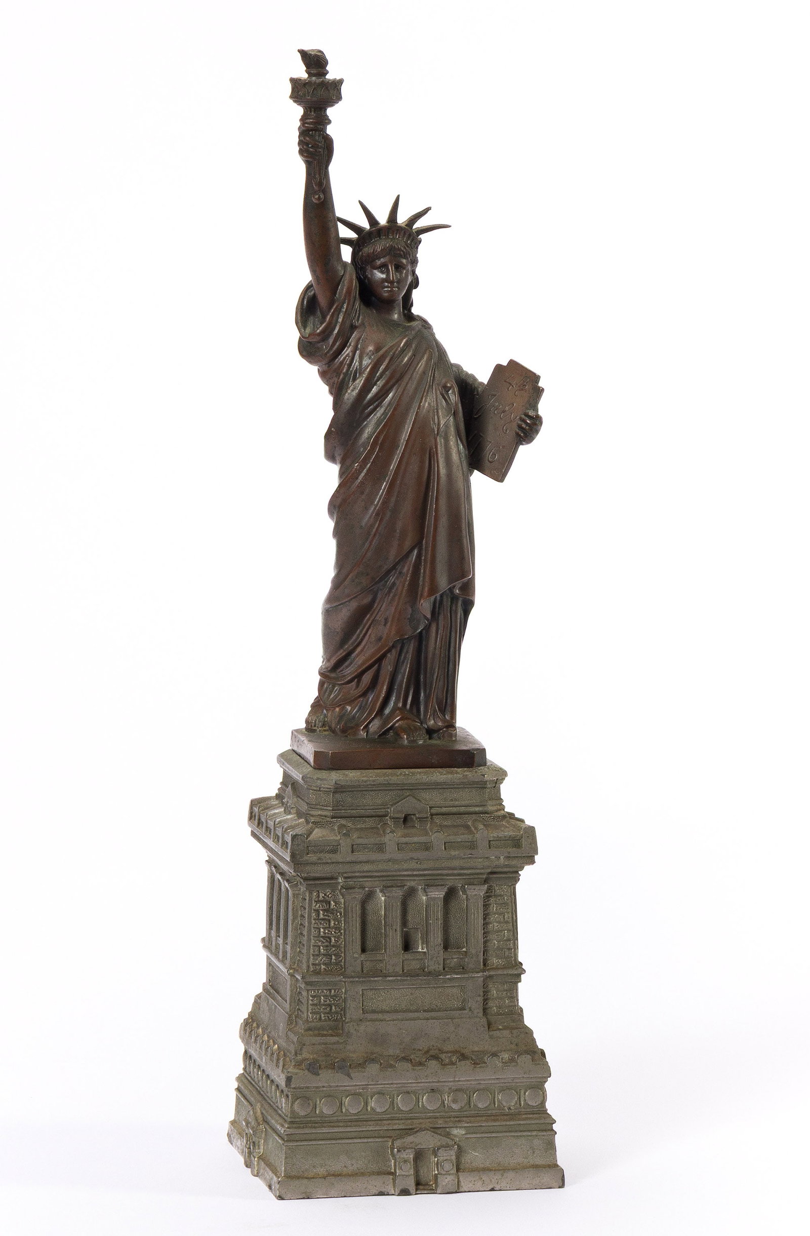 (NEW YORK CITY.) Statue of Liberty, American Committee Model. [New York, 1885]: Statue of Liberty, American Committee Model. [New York, 1885] Bronzed statue, with the detachable pedestal nickel-silvered, together 11¾ inches tall, 3 inches square at the base; minimal wear. Th