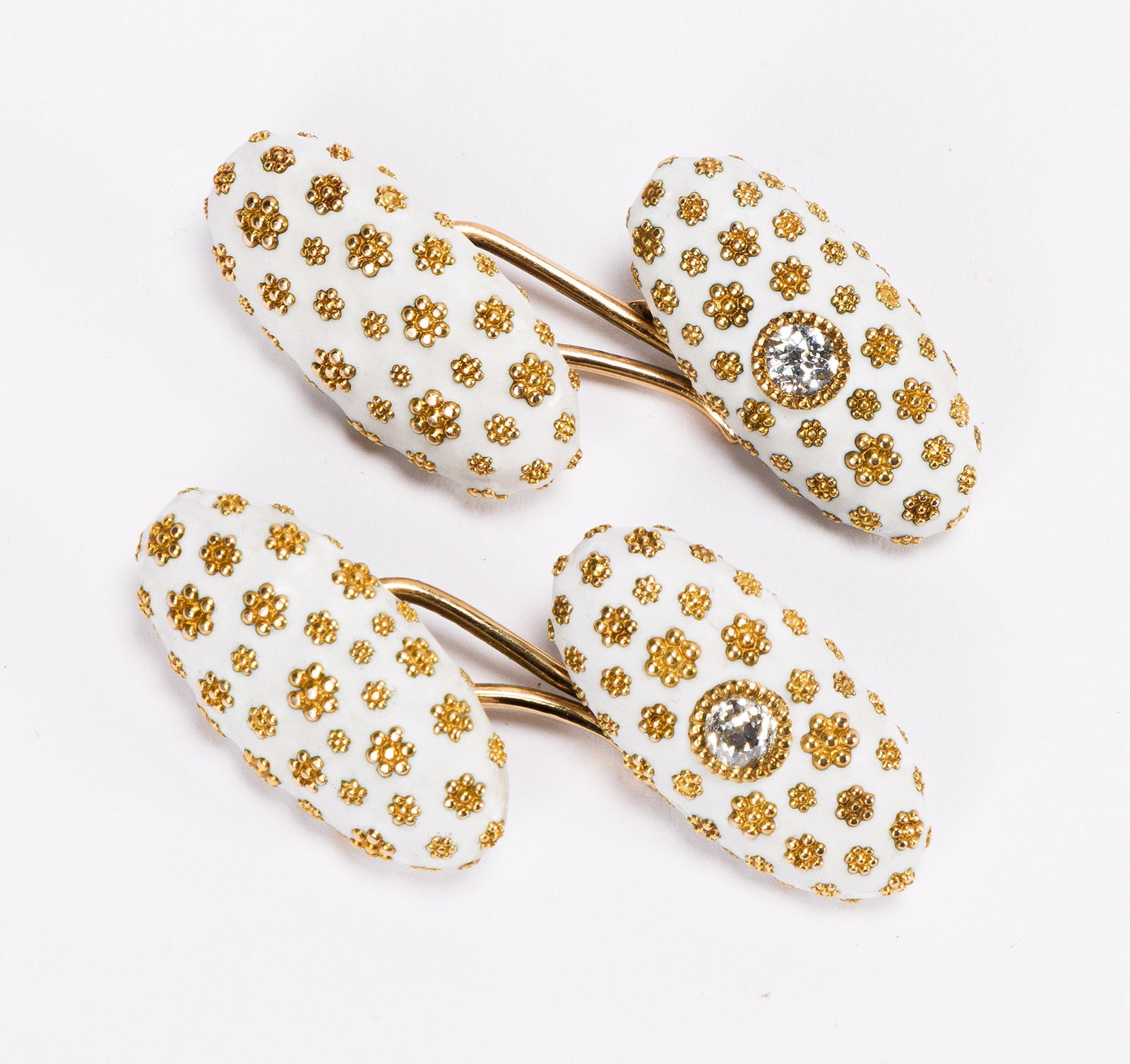 Cuff links given by George Platt Lynes to his partner Monroe Wheeler, with his gift card. Circa: Cuff links given by George Platt Lynes to his partner Monroe Wheeler, with his gift card. Circa 1920s. Pair of matching diamond-studded gold and enamel double-paneled cufflinks, each reading "Tiffany 