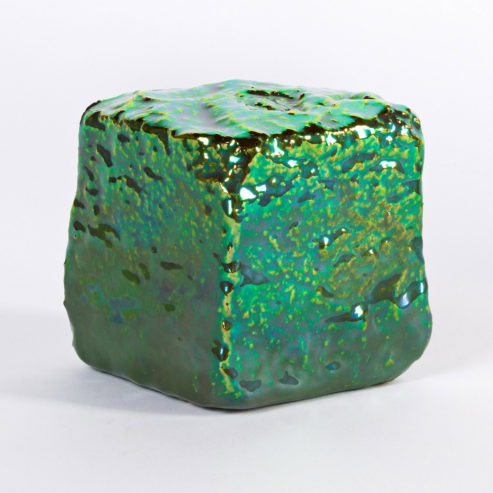 Julia Kunin, Emerald Cobble Stone. 2025.: Julia Kunin ( b. 1961) Emerald Cobble Stone. 2025. Ceramic with Zsolnay's eosin glaze. Signed and stamped with the Zsolnay, Hungary studio stamp on the underside. 3 3/8 x 3 x 3 in. (8.6 x 7.6 x 7.6 cm