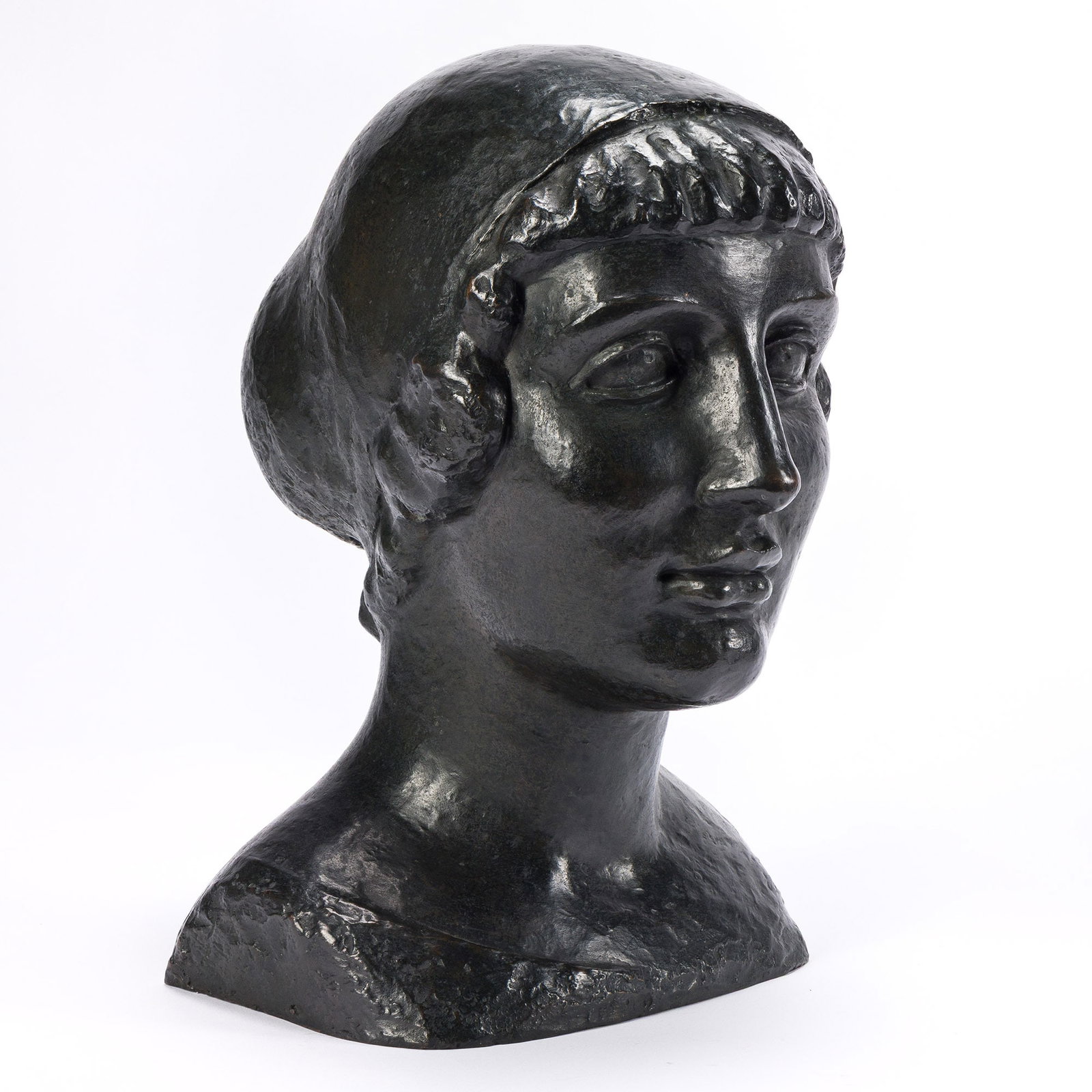 Aristide Maillol (1861-1944), Buste de femme, 1898.: Aristide Maillol (1861-1944) Buste de femme. Bronze, 1898. With the artist's monogram on the right edge. Cast by Alexis Rudier, Paris, with the foundry mark, verso, after 1898. 13 1/8 x 8 1/4 x 5 in. 
