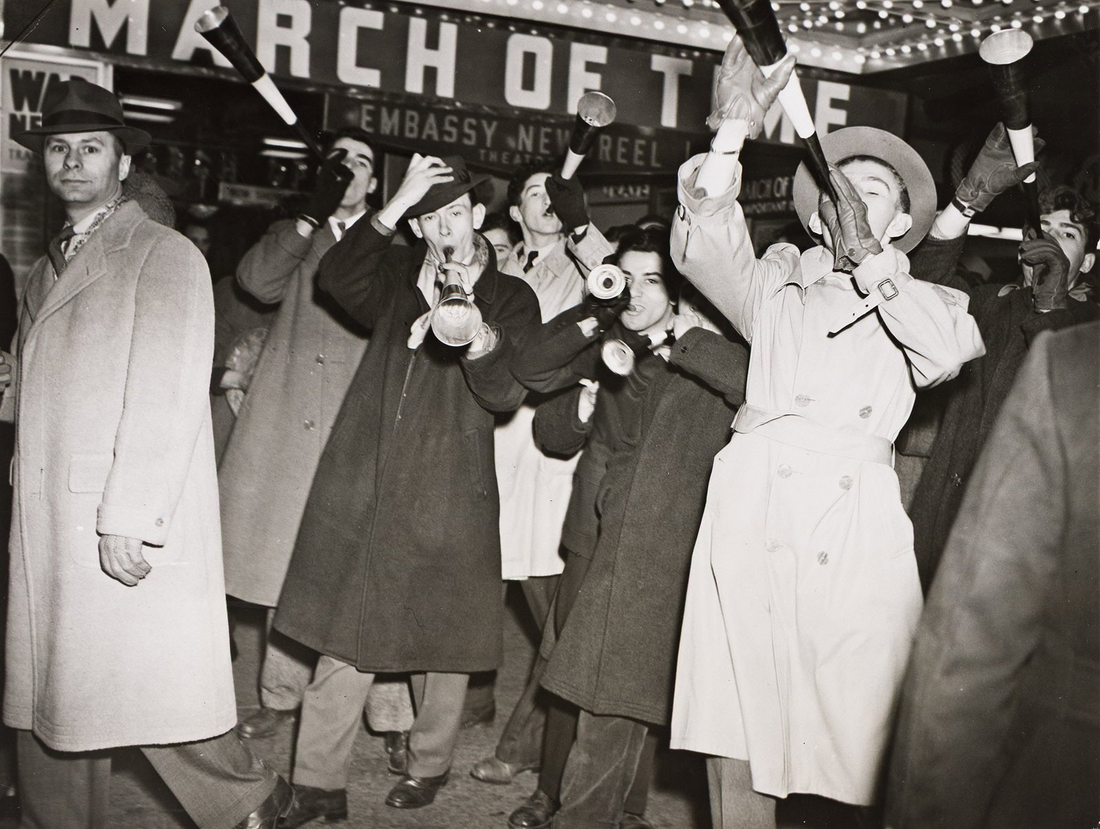 Matty Zimmerman, New Year's Eve Partygoers at Times Square, 1942.: Matty Zimmerman 1912-1966 New Year's Eve Partygoers at Times Square. 1942. Silver ferrotyped print. With a Wide World Photos stamp and a caption label with the date, on verso. The image 6 1/2 x 8 1/2 