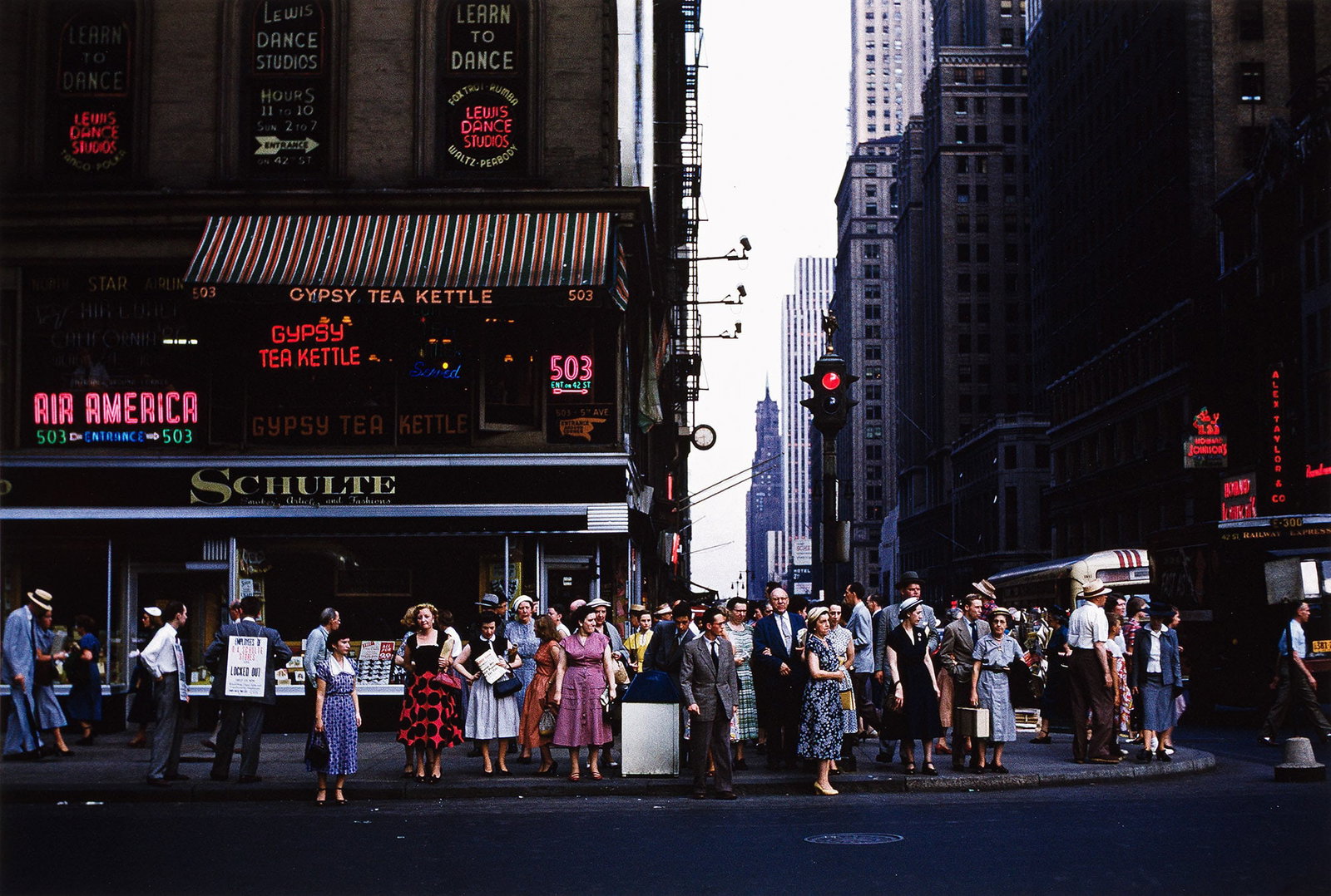 Ruth Orkin, People waiting to cross Sixth Avenue, New York City, 1945; printed later.: Ruth Orkin 1921-1985 People waiting to cross Sixth Avenue, New York City. 1955; printed later. Pigment print The image 25 1/2 x 38 in. (64.8 x 96.5 cm.), the sheet 30 x 40 in. (76.2 x 101.6 cm.) Add
