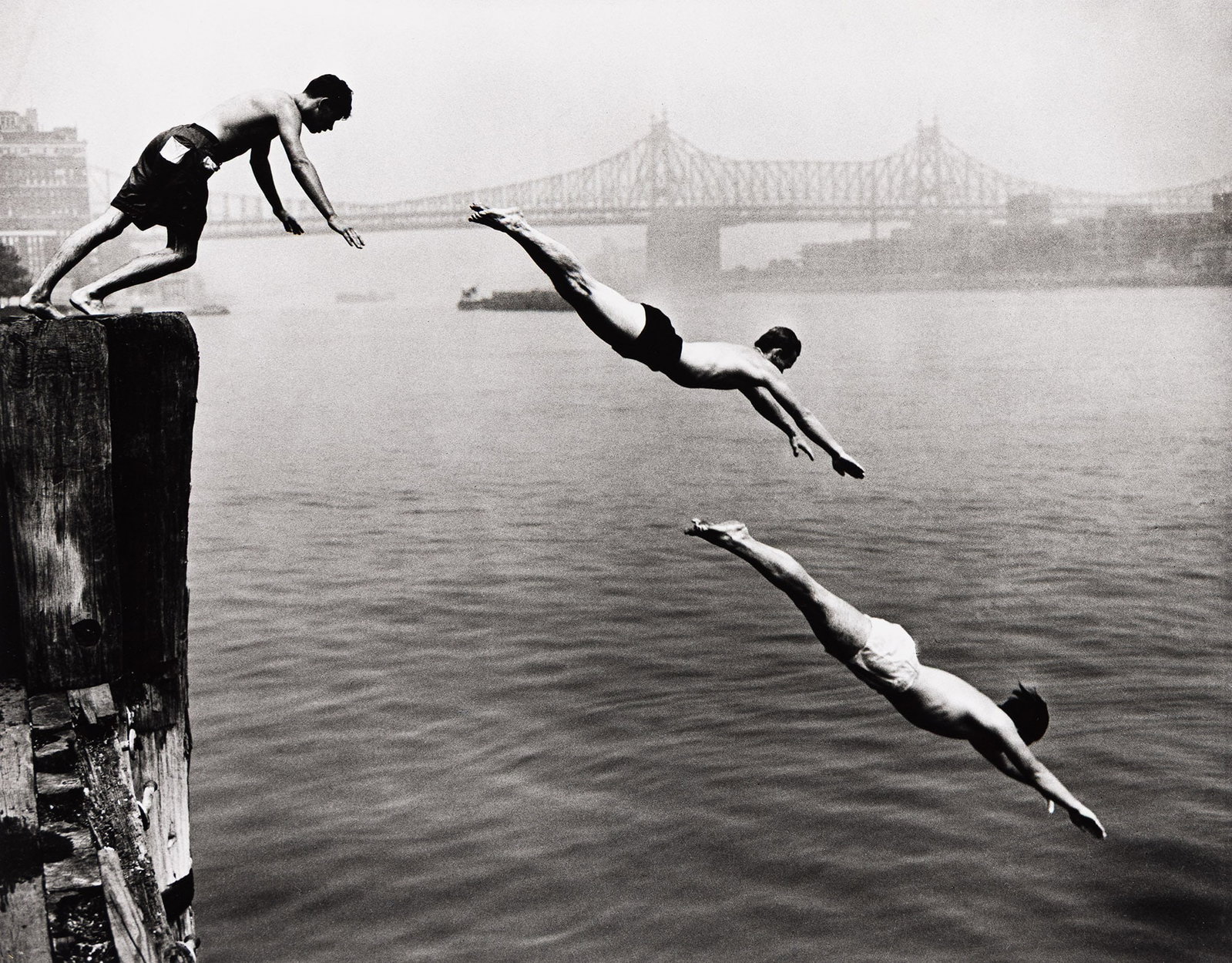 Arthur Leipzig, Divers, East River, 1948; printed 1980s.: Arthur Leipzig 1918-2014 Divers, East River. 1948; printed 1980s. Silver print. With Leipzig's signature in pencil and his credit and copyright stamps with the negative date in ink, on verso. The imag