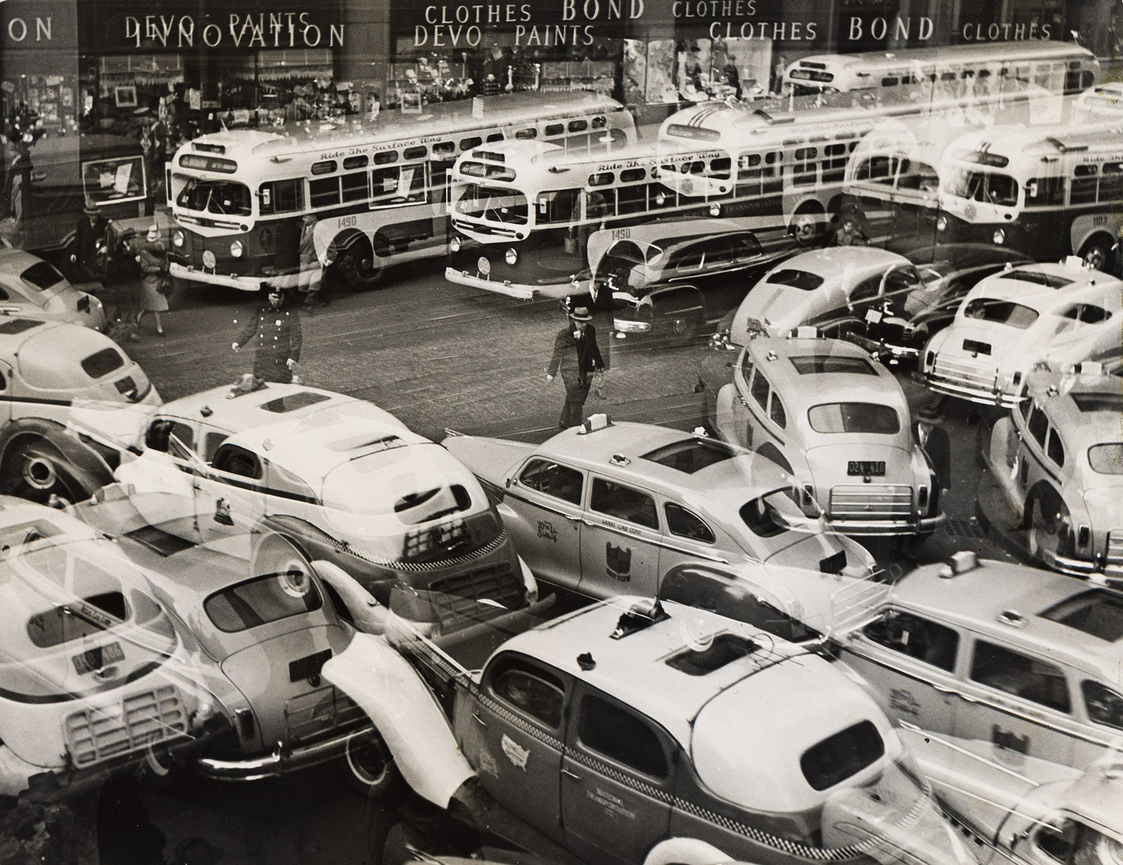 Louis B. Schlivek, New York City street scene, circa 1950.: Louis B. Schlivek Nd New York City street scene. Circa 1950. Silver print. With Schlivek's credit stamp, a typed credit label, and an American Society of Magazine Photographers stamp, on mount verso. 
