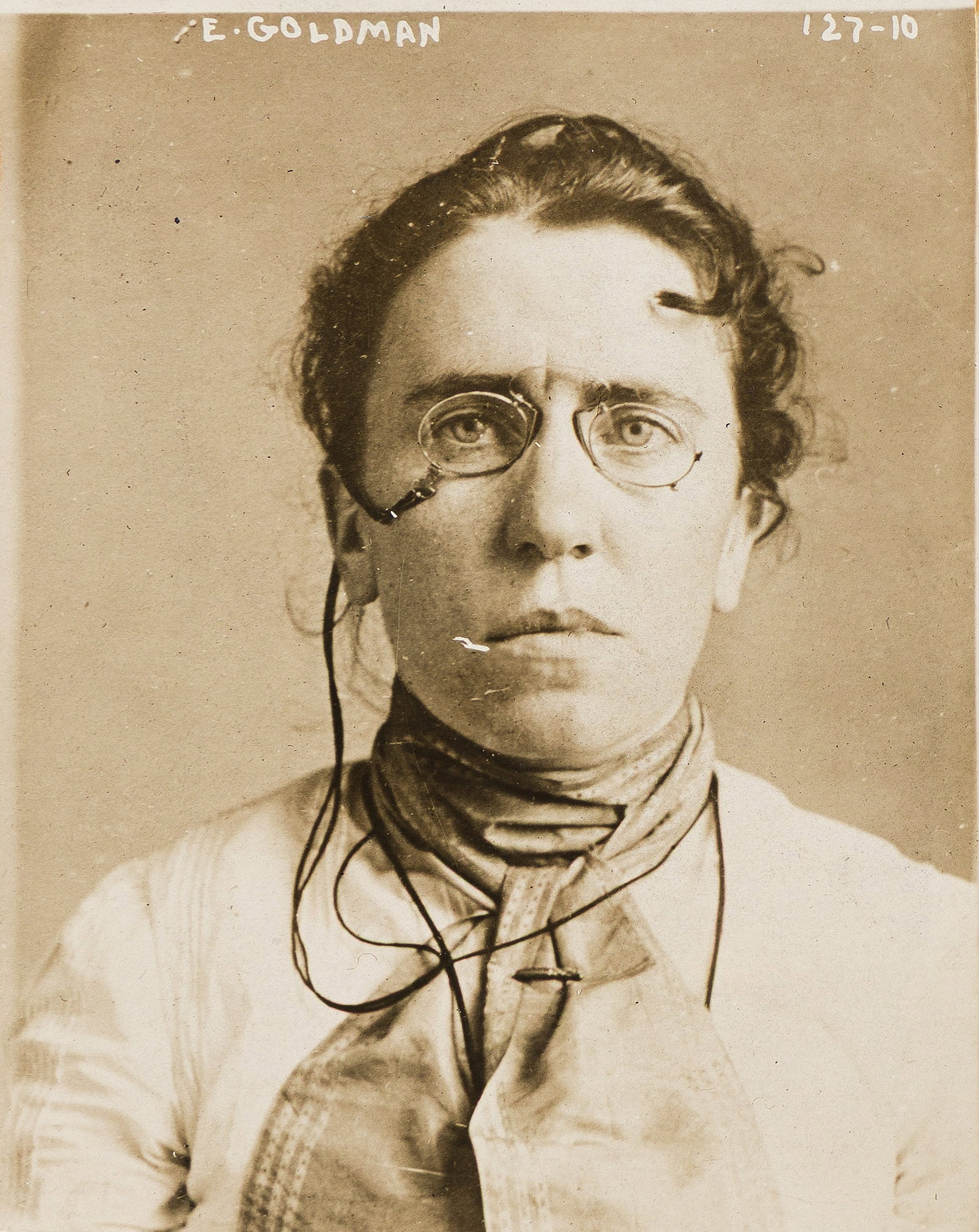 Mug shot of Emma Goldman, "The High Priestess of Anarchy." 1901.: Mug shot of Emma Goldman, "The High Priestess of Anarchy." 1901. Silver print With Goldman's name and a numeric notation in the negative, and the Culver Pictures stamps and barcode on the later mount 