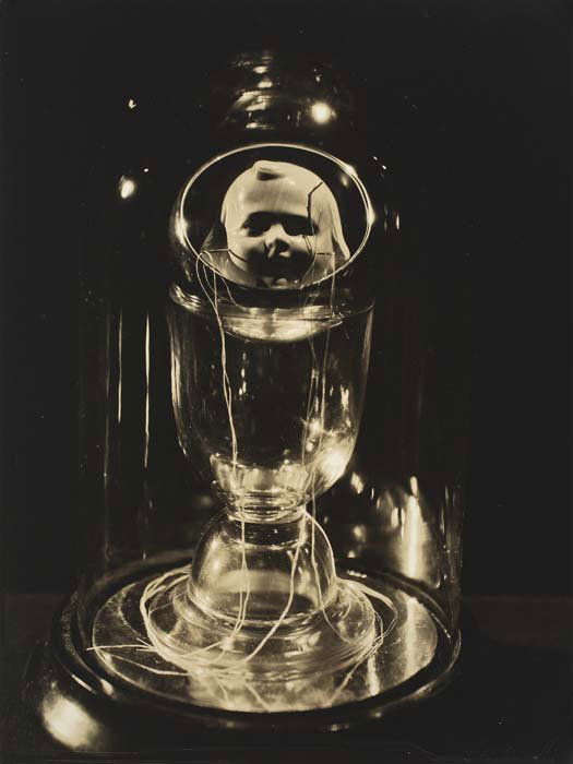 MILLER, LEE (1907-1977) Untitled (Joseph Corne: SIGNED BY MILLER AND JOSEPH CORNELL. MILLER, LEE (1907-1977) Untitled (Joseph Cornell Object). Warm-toned silver print, 9x6 inches (22.8x15.3 cm.), with Miller's signature on recto and Joseph Cornell