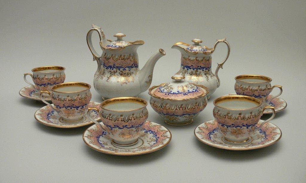 Coffee service, Loket (Elbogen), Bohemia, mid 19th cent: Coffee service, Loket (Elbogen), Bohemia, mid 19th century comprising a coffee pot, milk jug, sugar bowl, 5 cups with saucers; porcelain, overglaze paintings, gilt; coffee pot 7¼ in (18.5 cm) h