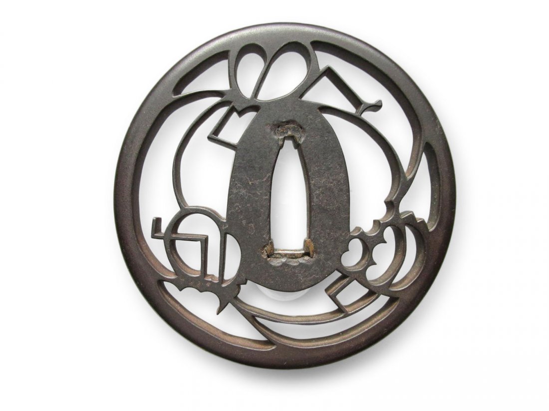 Large iron tsuba Akasaka school style with a insect: Large iron tsuba Akasaka school style with a insect theme, Edo Period, technique of openwork sukashi, gata maru, maru mimi shape. 81 — 80 — 6.8mm