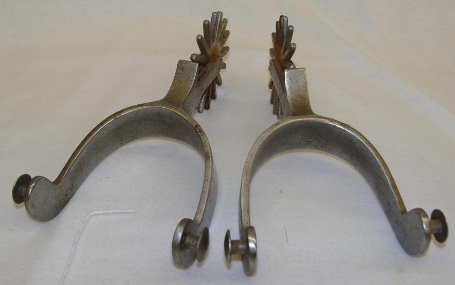 Oscar Crockett Spurs with 16 Point Rowels; 2.5" Diamete: Oscar Crockett Spurs with 16 Point Rowels; 2.5" Diameter. Auction Estimate $50-100.