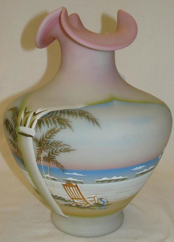 Large Fenton Art Glass Vase: Sailboats in Water and Bea: Large Fenton Art Glass Vase: Sailboats in Water and Beach Scene with Trees and Chair on sand. Artist Signed. 11.5" Ht. Auction Estimate $50-100.