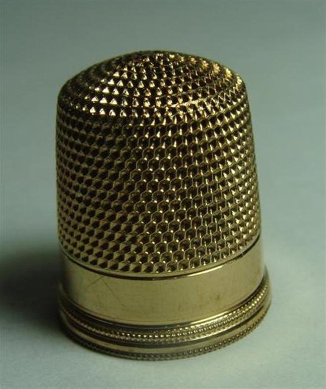Antique 10K Yellow Gold Thimble; 3.1 Grams. Auction: Antique 10K Yellow Gold Thimble; 3.1 Grams. Auction Estimate $100-200.