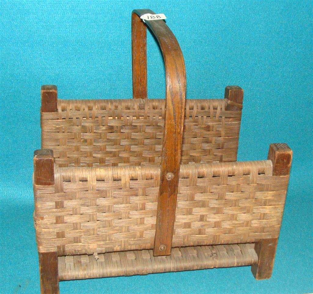 Antique Basket weaved Magazine /Newspaper Holder.: Antique Basket weaved Magazine /Newspaper Holder. Auction Estimate $50-100.