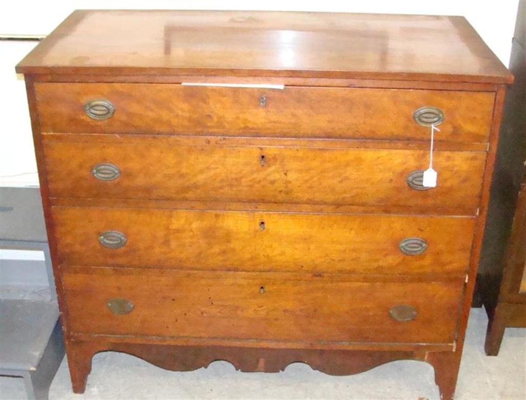 19th Century Genuine Hepplewhite Four Drawer Chest with: 19th Century Genuine Hepplewhite Four Drawer Chest with Original Pulls & Scroll Cut Skirt Ending in French Splayed Feet. 37.25" Ht x 42.25" Wd & 20.5" Depth. Auction Estimate $800-1200.