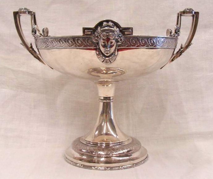 Signed Tiffany & Co Sterling Silver 50 Oz: Signed Tiffany & Co Sterling Silver Two Handled Centerpiece Front & Back with Highly Ornate Face of a Woman with Earrings & Necklace, Flowers on Handles. 11" Ht to Top of Handle & 13" Wd from Handle t