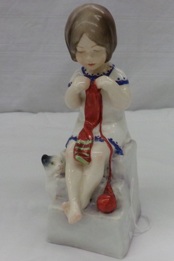 Royal Worcester Figurine: Saturdays Child Works Hard: Royal Worcester Figurine: Saturdays Child Works Hard for a Living; Depicts Young Girl Knitting; #3262. Auction Estimate $100-200.