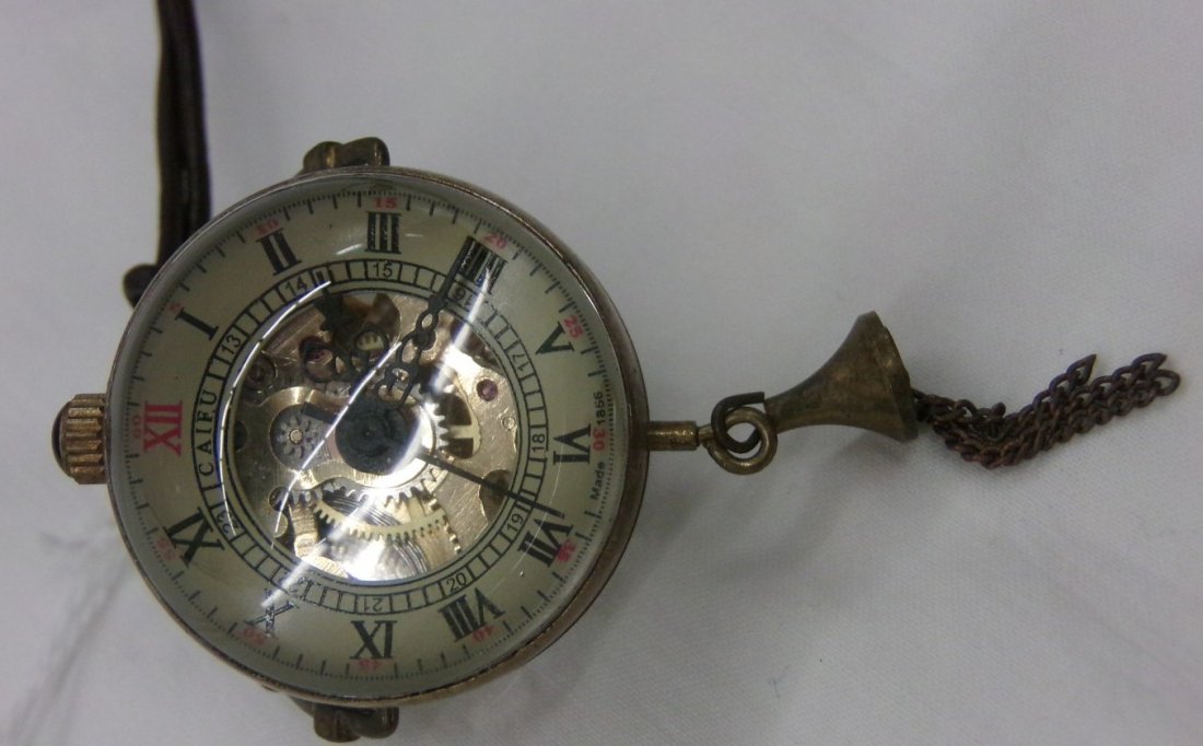 Antique Crystal Ball Watch; Dated 1856. Comes on: Antique Crystal Ball Watch; Dated 1856. Comes on Leather Chain, Working Condition. Auction Estimate $100-200.