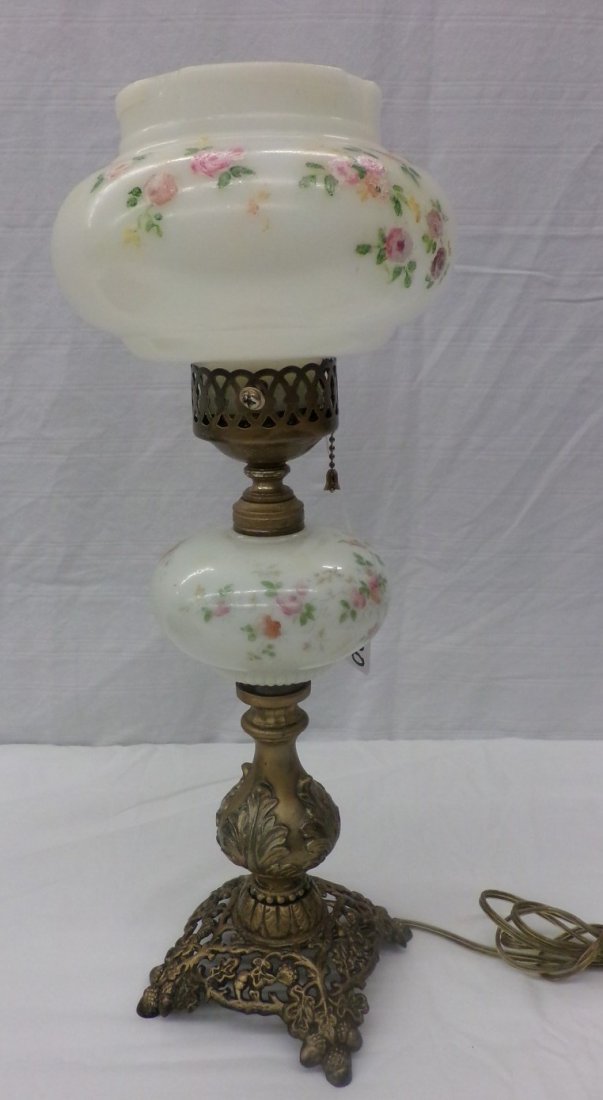 Hand Painted Boudoir Gone with the Wind Lamp; Brass: Hand Painted Boudoir Gone with the Wind Lamp; Brass Acorn Base with Hand Painted Globe Decorated with Flowers. Auction Estimate $50-100.