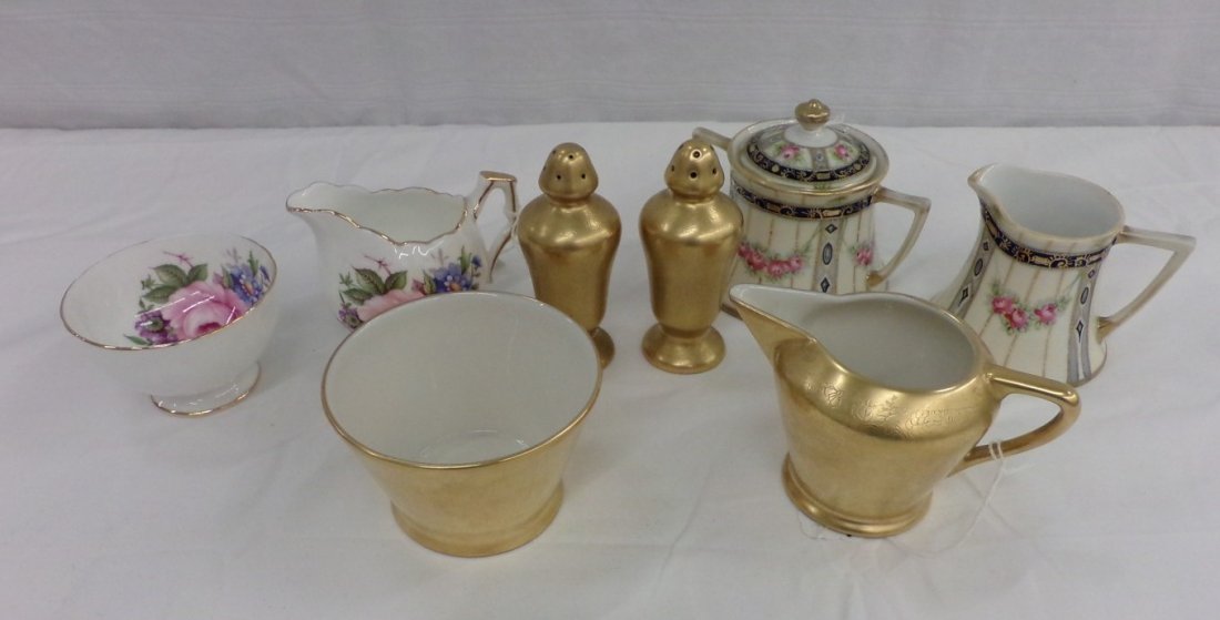 3 Sets of Creamers and Sugars: Includes Hand Painted: 3 Sets of Creamers and Sugars: Includes Hand Painted Nippon, Pickard with Salt & Pepper Shakers & Ansley with hand Painted Florals. Auction Estimate $50-100.