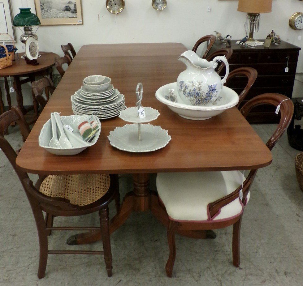 Triple Pedestaled Duncan Phyfe Dining Table; Extends to: Triple Pedestaled Duncan Phyfe Dining Table; Extends to 97" L. Note: Normal Wear. Auction Estimate $200-300.