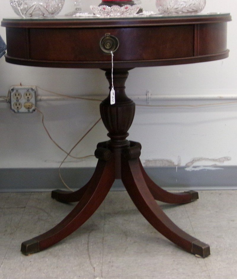 Antique Mahogany One Drawer Duncan Phyfe Style Drum: Antique Mahogany One Drawer Duncan Phyfe Style Drum Table with Leather Insert and Glass Cover. Auction Estimate $100- 200.
