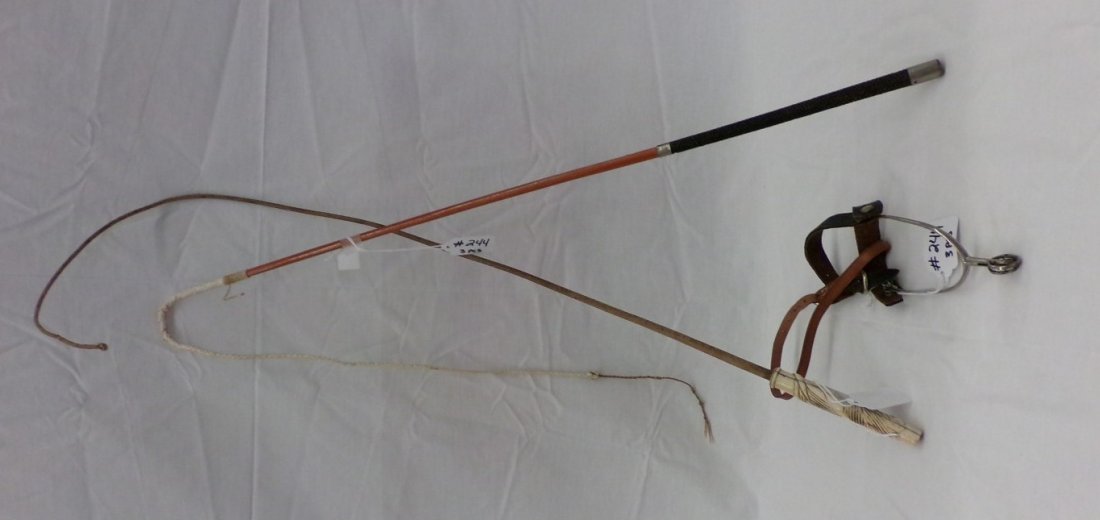 Two Antique Riding Crops & a Spur; One Riding Crop has: Two Antique Riding Crops & a Spur; One Riding Crop has an Ivory Handle with Age Appropriate Wear (Hairline Crack) Auction Estimate $50-100.