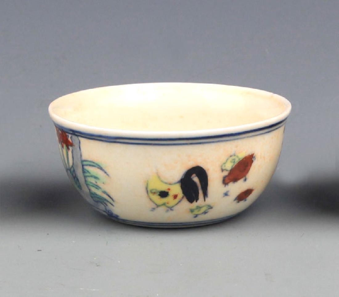A FINE DOUCAI "CHICKEN" CUP (1 of 4)