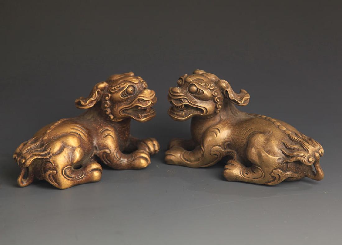 PAIR OF BRONZE RUI SHOU FIGURE PAPER WEIGHT (1 of 4)