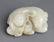 A CARVED WHITE JADE PENDANT IN FIGURE OF GRAZING - 2