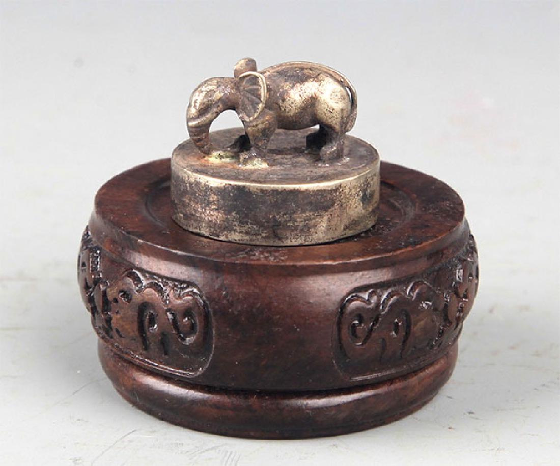 A SILVER PLATED ELEPHANT SHAPED SEAL (1 of 4)