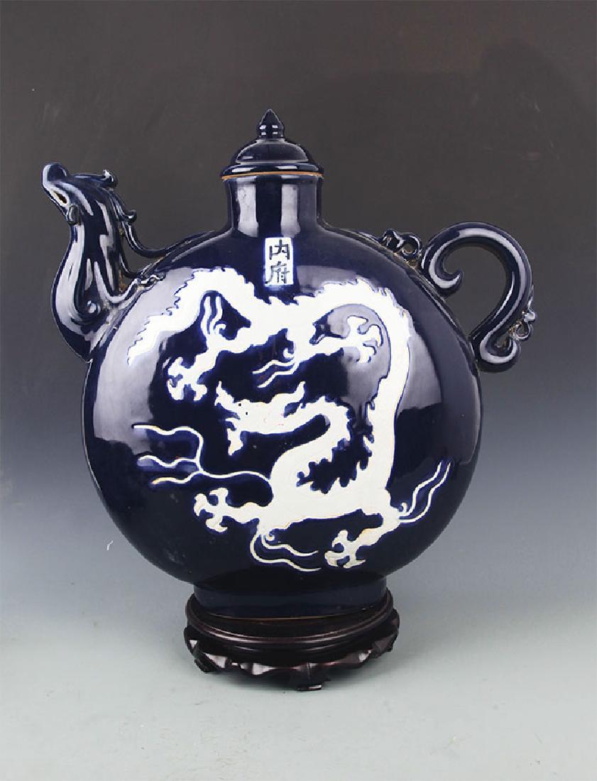 A DARK BLUE COLOR DRAGON PORCELAIN WATER BOTTLE: Ming Dynasty, High: 19.5 inch; Width: 18.5 inch