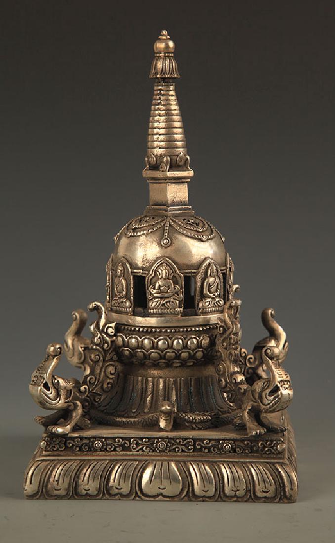 A FINELY CARVED BRONZE STUPA (1 of 5)