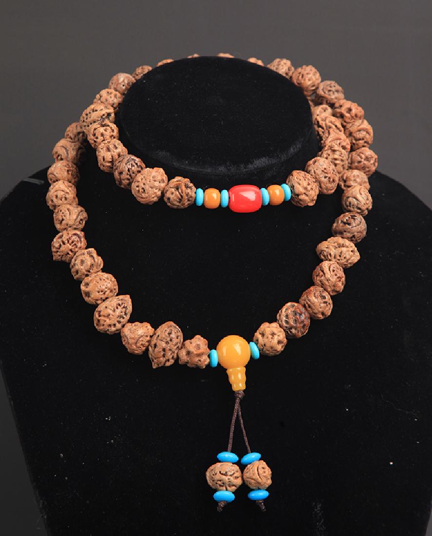 A PEACH NUT PRAYER BEADS NECKLACE (1 of 5)