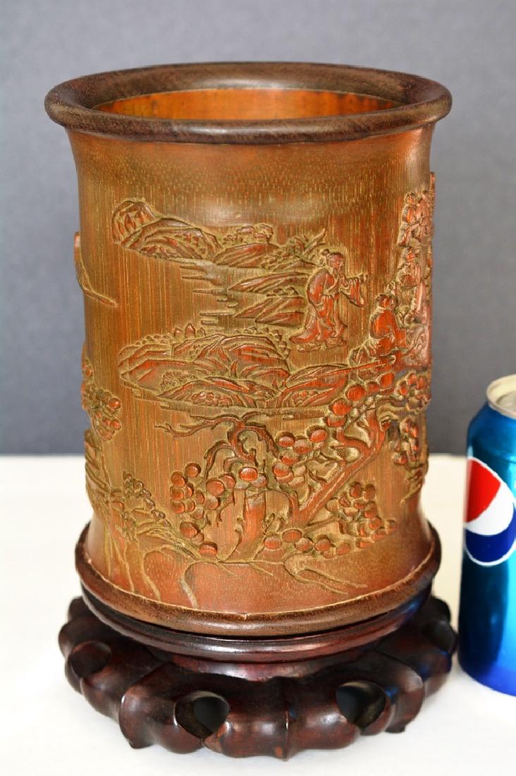 A CARVED BAMBOO BRUSHPOT WITH FIGURE (1 of 4)