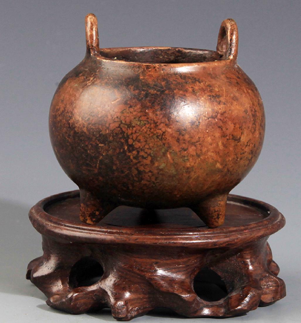 A ROUND TRIPOD FOOT CENSER: Possibly Ming Dynasty, High: 2.25 inch - Diameter: 1.75 inch