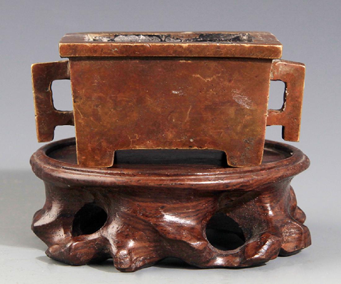 A FINE DOUBLE EAR BRONZE CENSER (1 of 3)