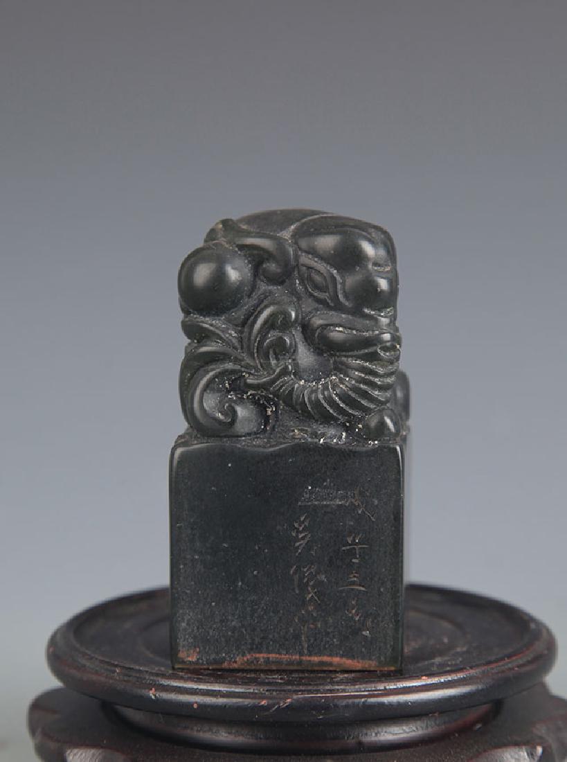 A FINELY CARVED SOPE STONE SEAL (1 of 4)