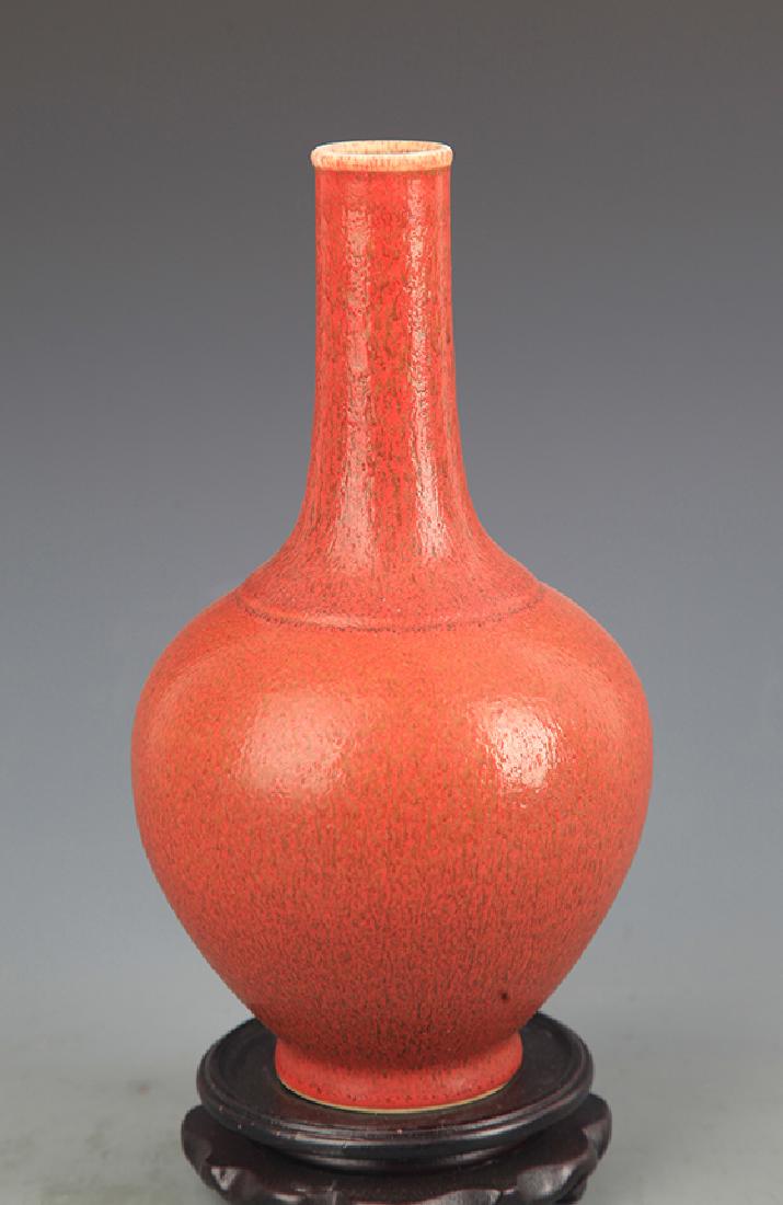 A RED COLOR GLAZED PORCELAIN VASE (1 of 4)