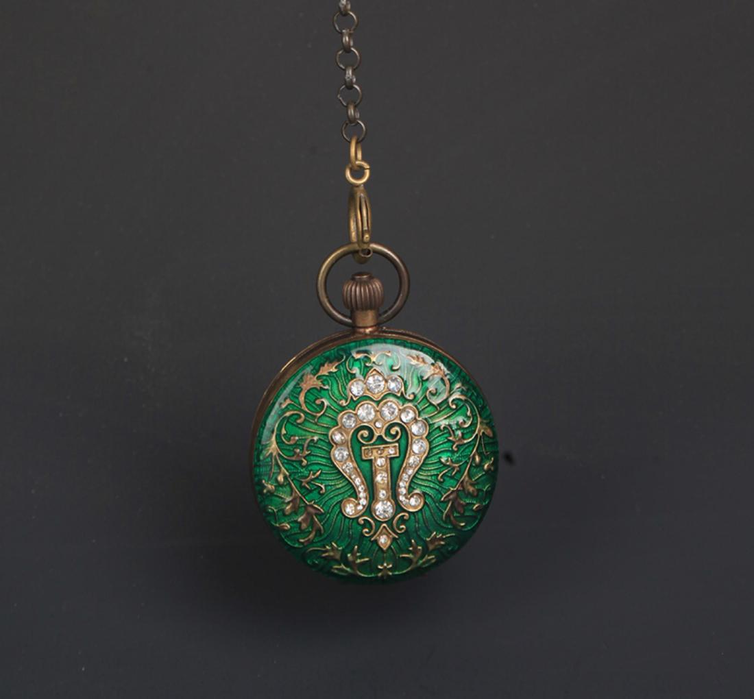 A BRONZE GREEN GROUND ENAMEL POCKET WATCH (1 of 5)
