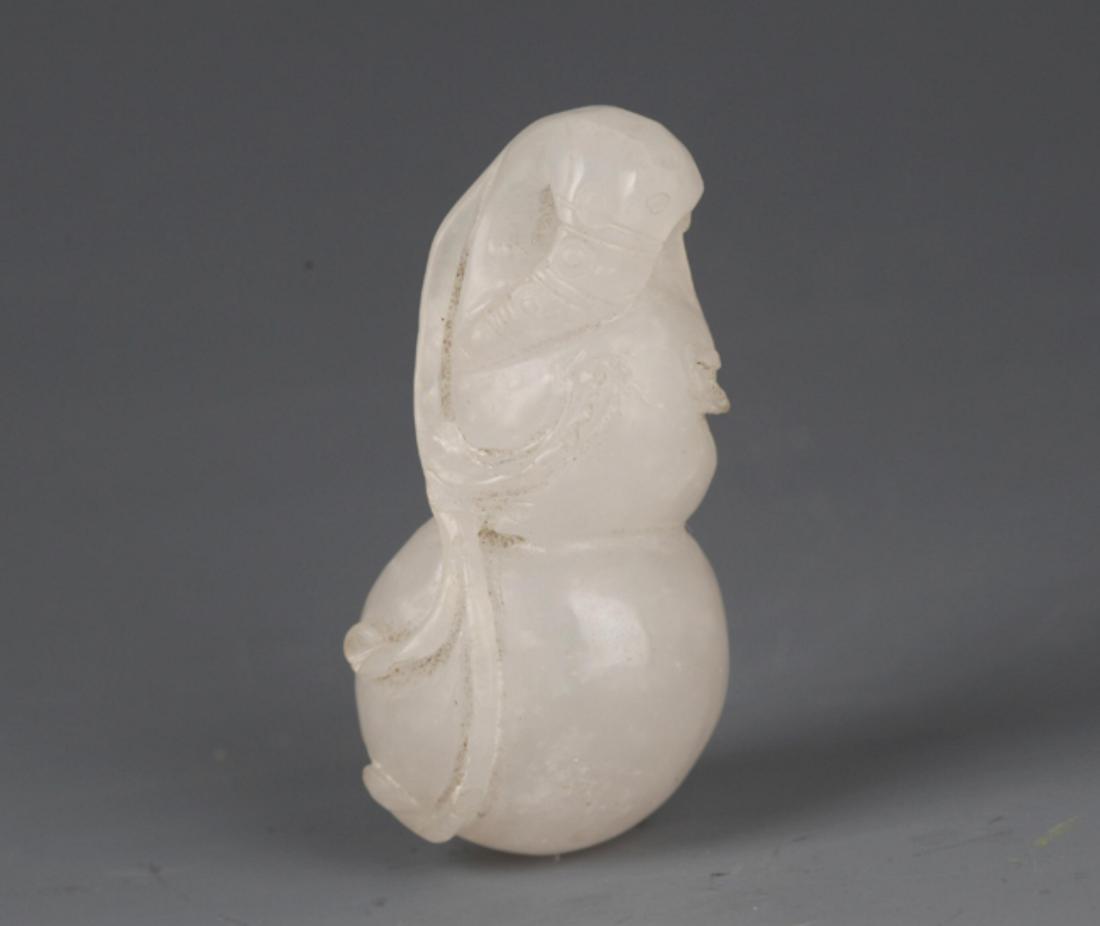 A FINE HETIAN WHITE JADE IN FIGURE OF GOURD (1 of 4)