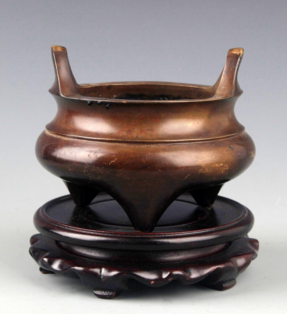 A DOUBLE EAR ROUND BRONZE CENSER (1 of 3)