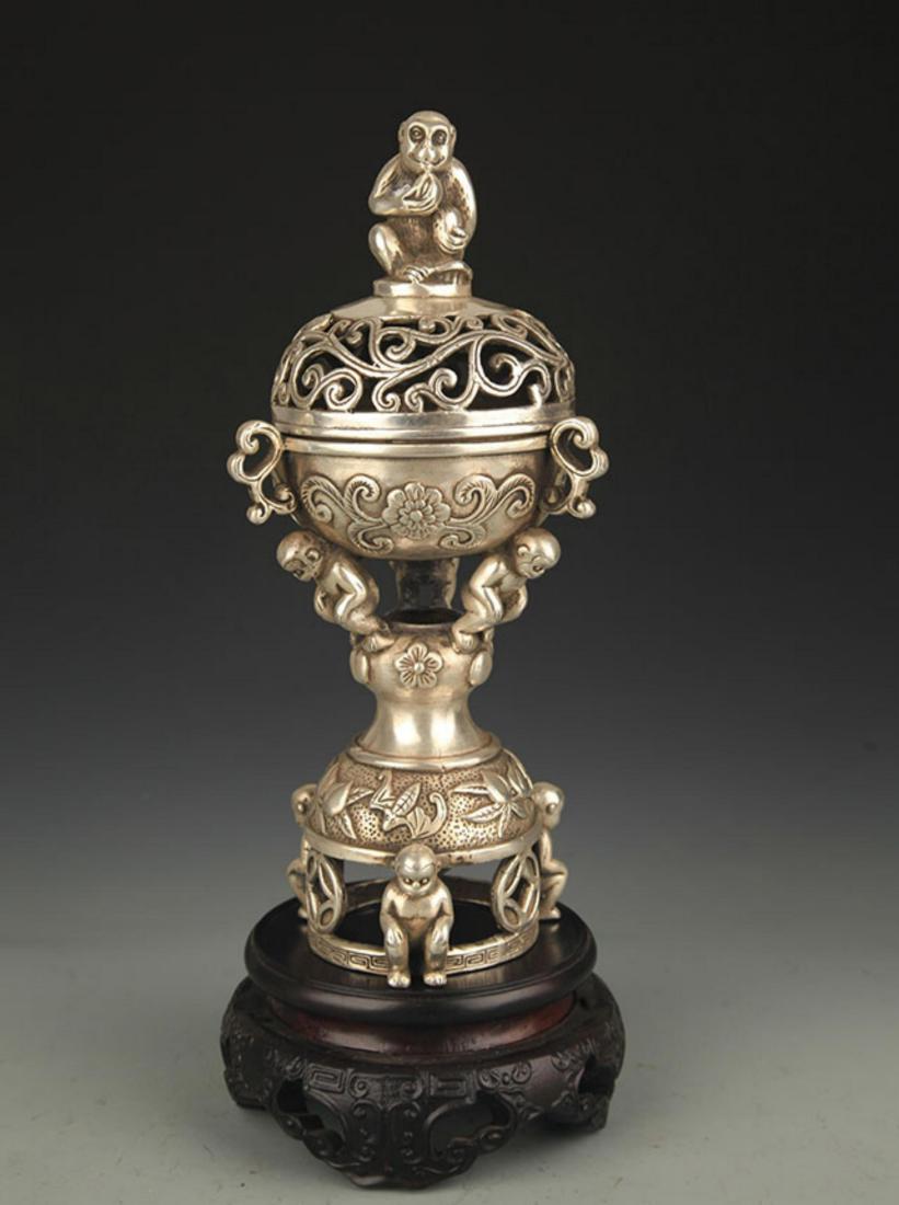 A BRONZE MONEY FIGURE AROMATHERAPY BURNER (1 of 6)