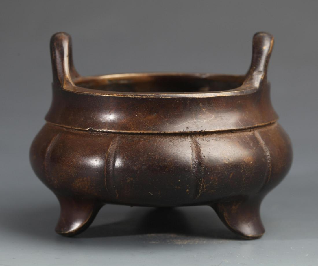 A TRIPOD BRONZE CENSER: Possible Qing Dynasty, Long: 3.1 inch; High: 2.8 inch