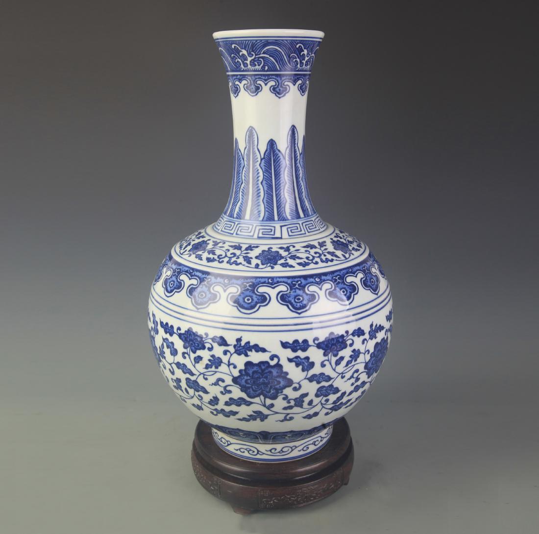 RARE TALL BLUE AND WHITE FLOWER PATTERN PORCELAIN VASE (1 of 4)